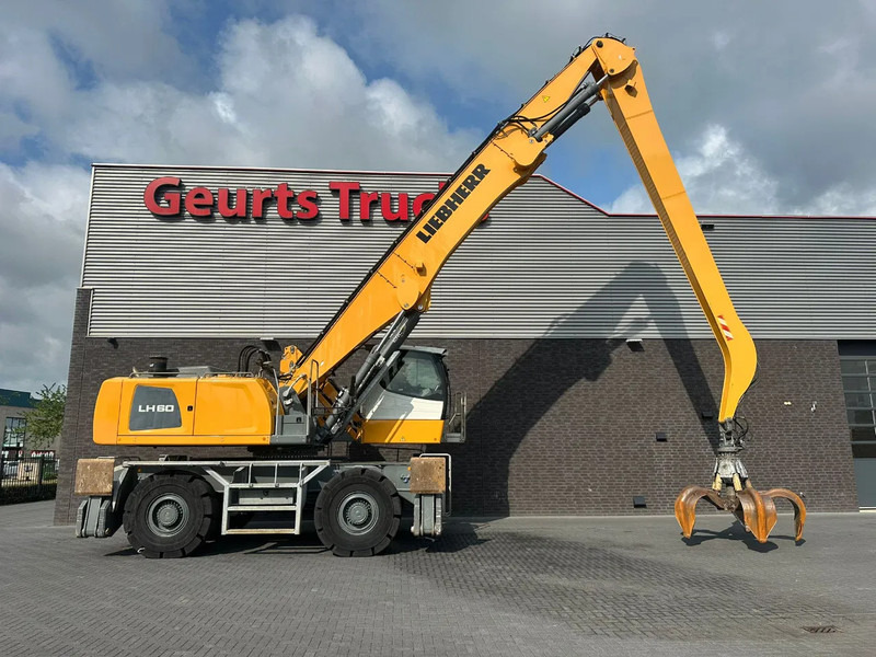 Liebherr LH 60 M LITRONIC INDUSTRY MATERIAL HANDLER/ UMSCHLAGBAGGER/ OVERSLAGKRAAN - Máy cạp rác/ Công nghiệp: hình 4 Liebherr LH 60 M LITRONIC INDUSTRY MATERIAL HANDLER/ UMSCHLAGBAGGER/ OVERSLAGKRAAN - Máy cạp rác/ Công nghiệp: hình 4