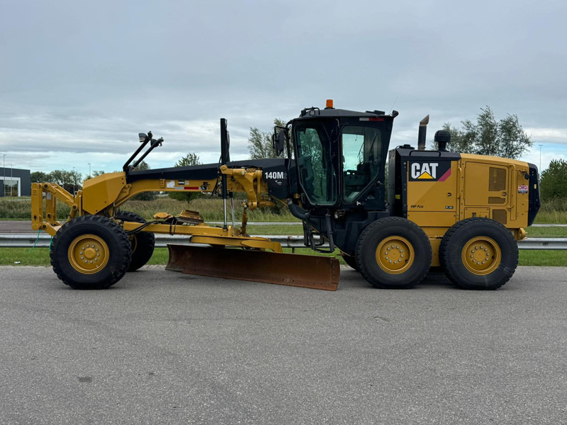 Caterpillar 140M2 - Máy san: hình 1 Caterpillar 140M2 - Máy san: hình 1