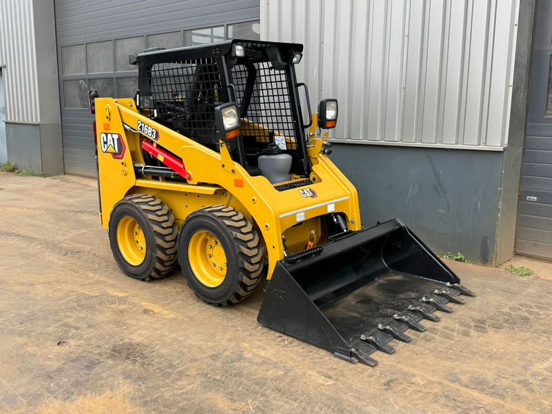 Caterpillar 216B3 - Máy xúc lật bánh lốp: hình 5 Caterpillar 216B3 - Máy xúc lật bánh lốp: hình 5