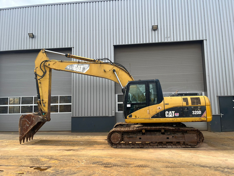 Caterpillar 320D - bucket with teeth - Máy xúc bánh xích: hình 1 Caterpillar 320D - bucket with teeth - Máy xúc bánh xích: hình 1