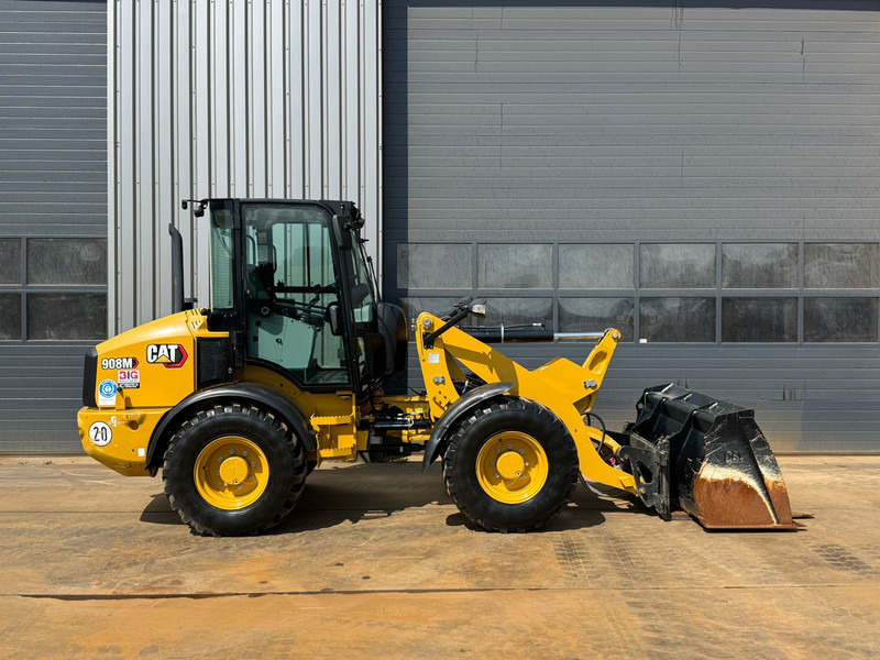 Caterpillar 908M - Máy xúc lật bánh lốp: hình 5 Caterpillar 908M - Máy xúc lật bánh lốp: hình 5