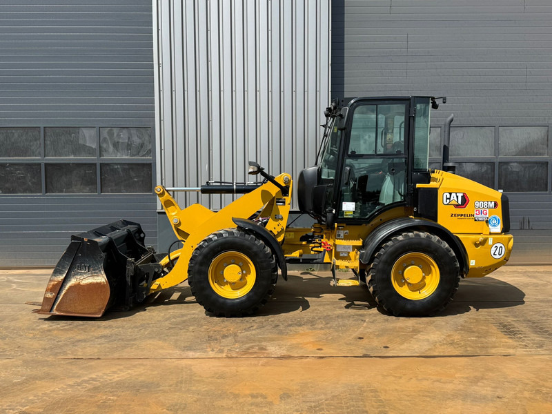 Caterpillar 908M - Máy xúc lật bánh lốp: hình 1 Caterpillar 908M - Máy xúc lật bánh lốp: hình 1