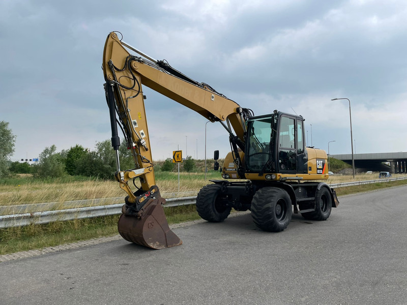 Caterpillar M313D - CE - Máy xúc bánh lốp: hình 3 Caterpillar M313D - CE - Máy xúc bánh lốp: hình 3