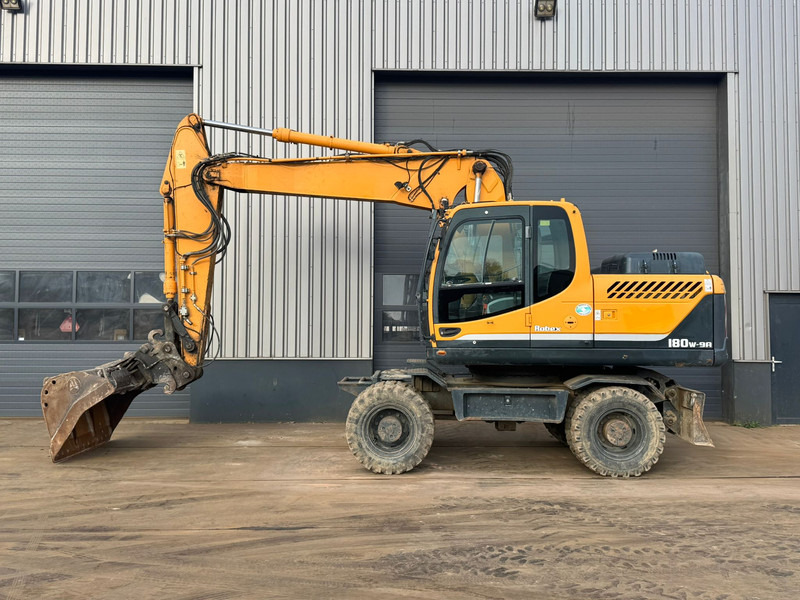 Hyundai Robex 180W-9A - Máy xúc bánh lốp: hình 1 Hyundai Robex 180W-9A - Máy xúc bánh lốp: hình 1