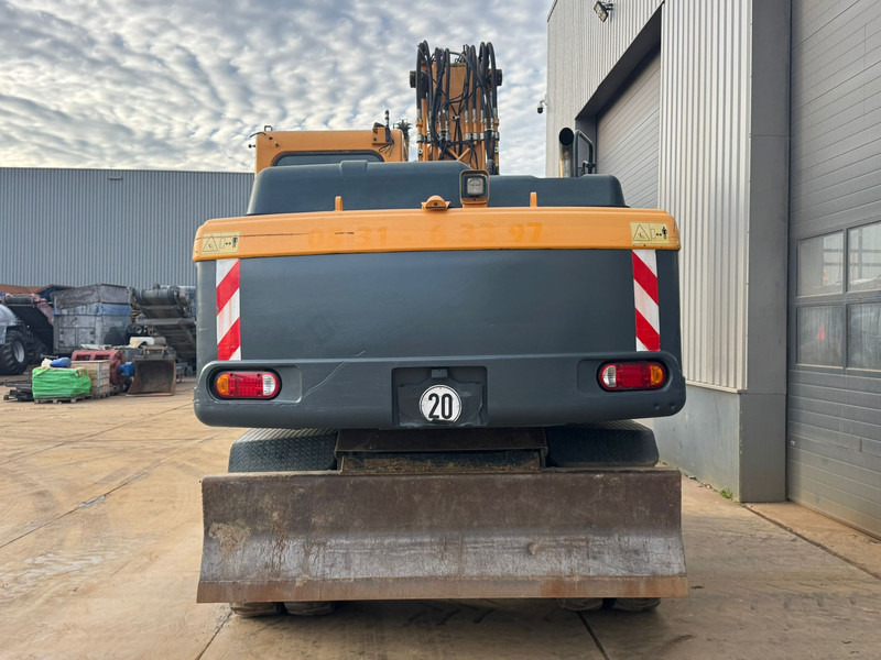 Hyundai Robex 180W-9A - Máy xúc bánh lốp: hình 4 Hyundai Robex 180W-9A - Máy xúc bánh lốp: hình 4