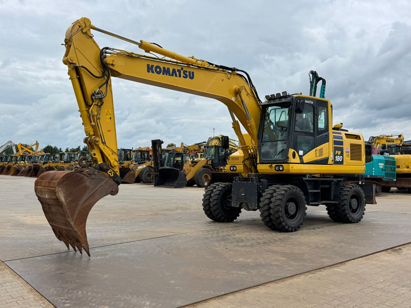 Komatsu PW180-11 - Máy xúc bánh lốp: hình 2 Komatsu PW180-11 - Máy xúc bánh lốp: hình 2