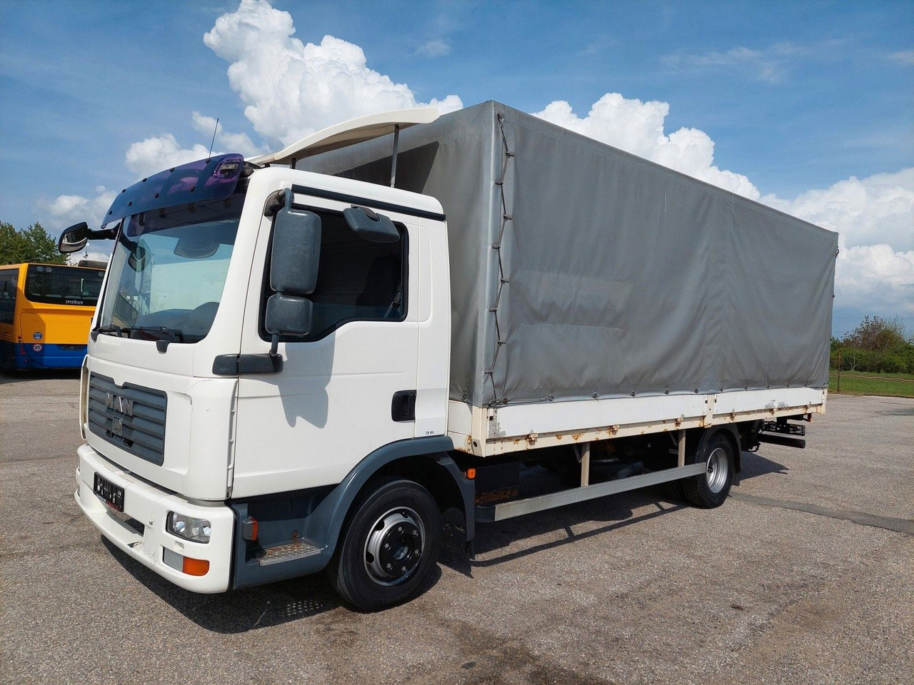 MAN TGL 8.180 4X2 BL - Xe tải thùng mui bạt: hình 1 MAN TGL 8.180 4X2 BL - Xe tải thùng mui bạt: hình 1