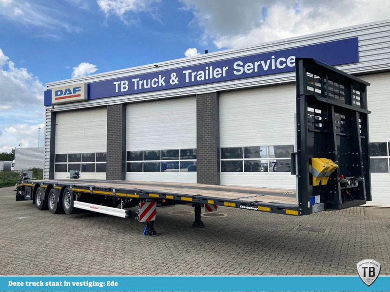 Kässbohrer SPS HM 3 / 0N - 18 / 27 Vlakke mega trailer met liftas, 18x rongen en kist voor de oprijplaten - Sơ mi rơ moóc thùng lửng/ Phẳng: hình 1 Kässbohrer SPS HM 3 / 0N - 18 / 27 Vlakke mega trailer met liftas, 18x rongen en kist voor de oprijplaten - Sơ mi rơ moóc thùng lửng/ Phẳng: hình 1