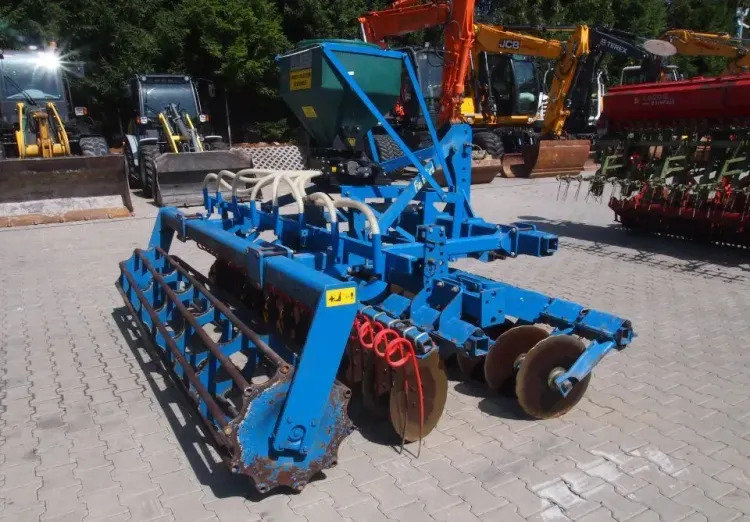 Agregat uprawowo-siewny Rabe Werk 2011 3m brona talerzowa z siewnikiem do poplonów - Máy gieo hạt liên hợp: hình 5 Agregat uprawowo-siewny Rabe Werk 2011 3m brona talerzowa z siewnikiem do poplonów - Máy gieo hạt liên hợp: hình 5