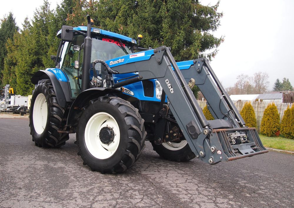 Ciągnik New Holland NH TS125A 6 cylindrów 2004 Ciągnik rolniczy New Holland TS125A - Máy cày: hình 2 Ciągnik New Holland NH TS125A 6 cylindrów 2004 Ciągnik rolniczy New Holland TS125A - Máy cày: hình 2