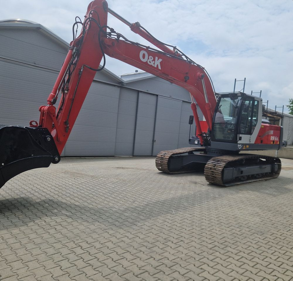Koparka gąsienicowa O&K RH6,5 2003 Koparka gąsienicowa O&K - Máy xúc bánh xích: hình 1 Koparka gąsienicowa O&K RH6,5 2003 Koparka gąsienicowa O&K - Máy xúc bánh xích: hình 1