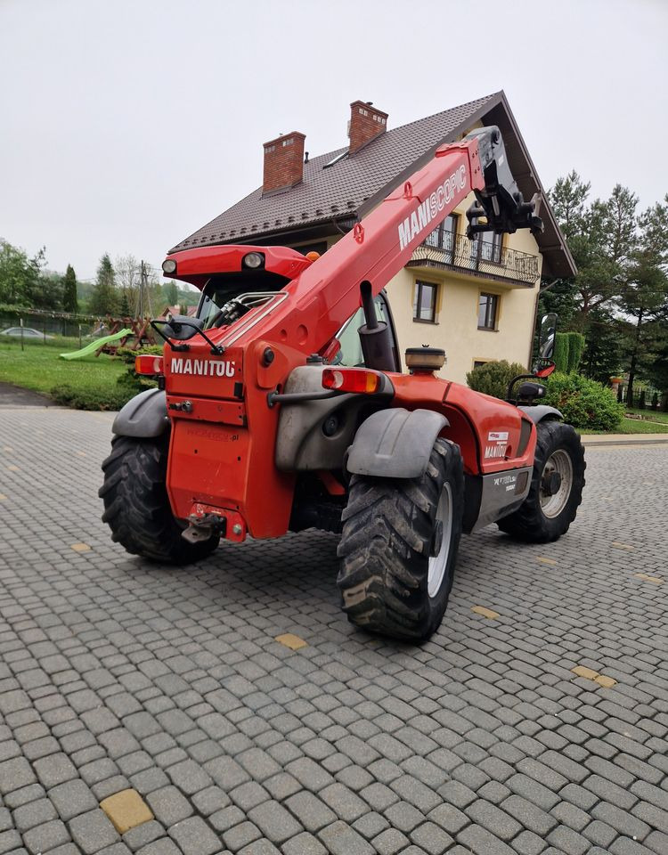 Ładowarka teleskopowa Manitou MLT 735-120 LSU 2012 Ładowarka teleskopowa Manitou MLT 735-120 LSU - Xe nhấc hình viễn vọng kính: hình 5 Ładowarka teleskopowa Manitou MLT 735-120 LSU 2012 Ładowarka teleskopowa Manitou MLT 735-120 LSU - Xe nhấc hình viễn vọng kính: hình 5