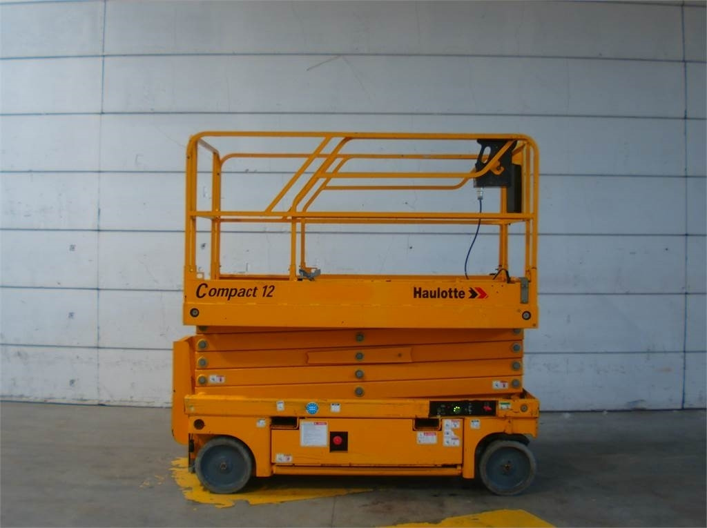 Haulotte Compact 12 - Máy nâng người hình kéo: hình 1 Haulotte Compact 12 - Máy nâng người hình kéo: hình 1