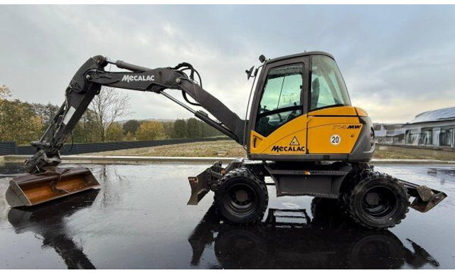 Mecalac 714 MW - Máy xúc bánh lốp: hình 1 Mecalac 714 MW - Máy xúc bánh lốp: hình 1