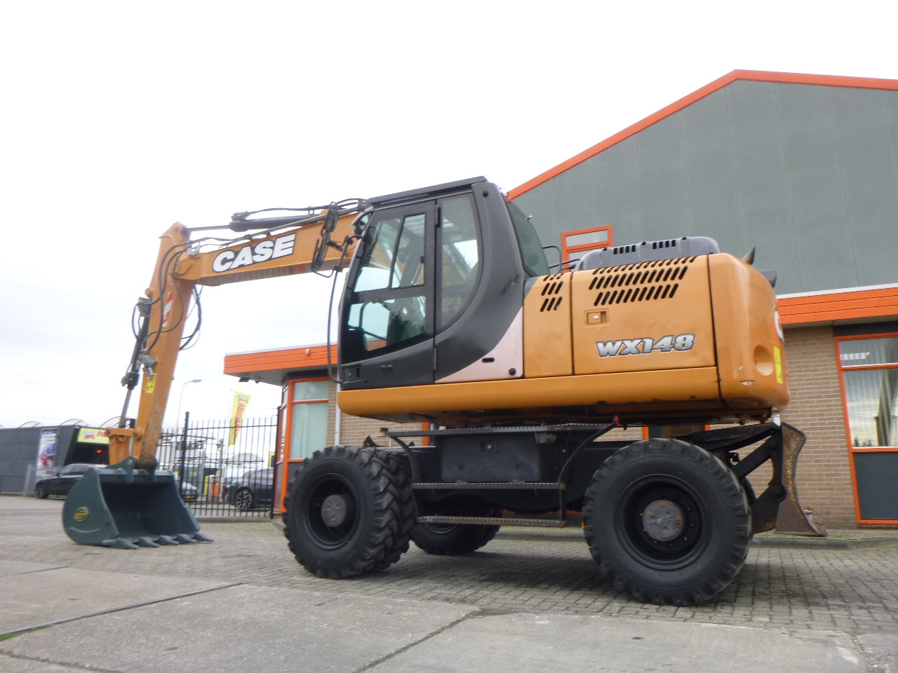 CASE WX148 - Máy xúc bánh lốp: hình 2 CASE WX148 - Máy xúc bánh lốp: hình 2