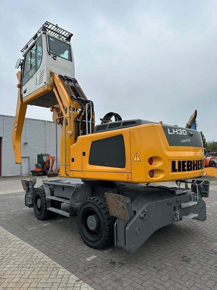 Liebherr LH 30 M - Máy cạp rác/ Công nghiệp: hình 3 Liebherr LH 30 M - Máy cạp rác/ Công nghiệp: hình 3