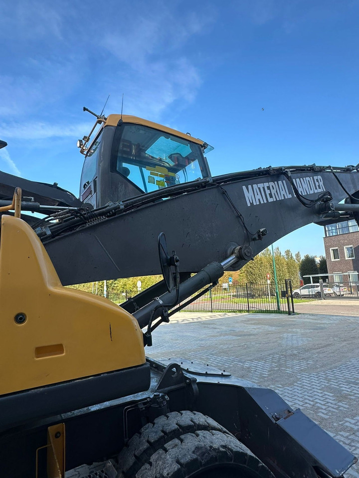 Máy cạp rác/ Công nghiệp Volvo EW210D MH: hình 15 Máy cạp rác/ Công nghiệp Volvo EW210D MH: hình 15