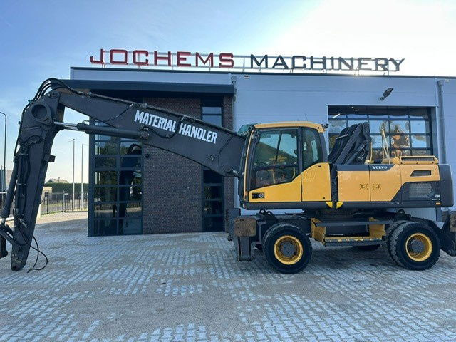 Máy cạp rác/ Công nghiệp Volvo EW210D MH: hình 14 Máy cạp rác/ Công nghiệp Volvo EW210D MH: hình 14