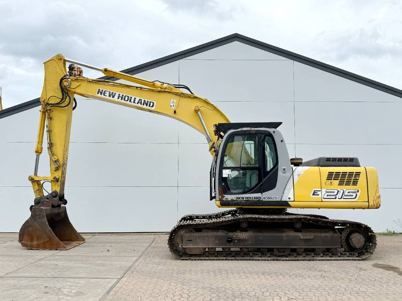 New Holland E215LC - German Machine / Hammer Lines - Máy xúc bánh xích: hình 1 New Holland E215LC - German Machine / Hammer Lines - Máy xúc bánh xích: hình 1