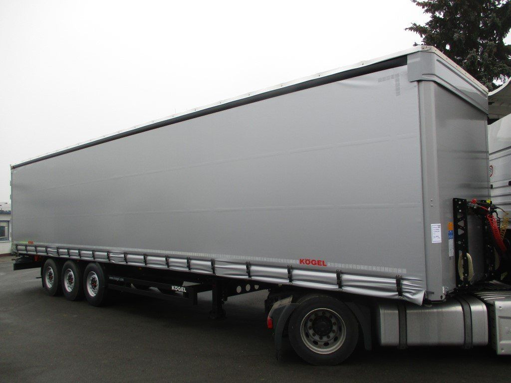Kögel Cargo - Sơ mi rơ moóc mui bạt: hình 1 Kögel Cargo - Sơ mi rơ moóc mui bạt: hình 1