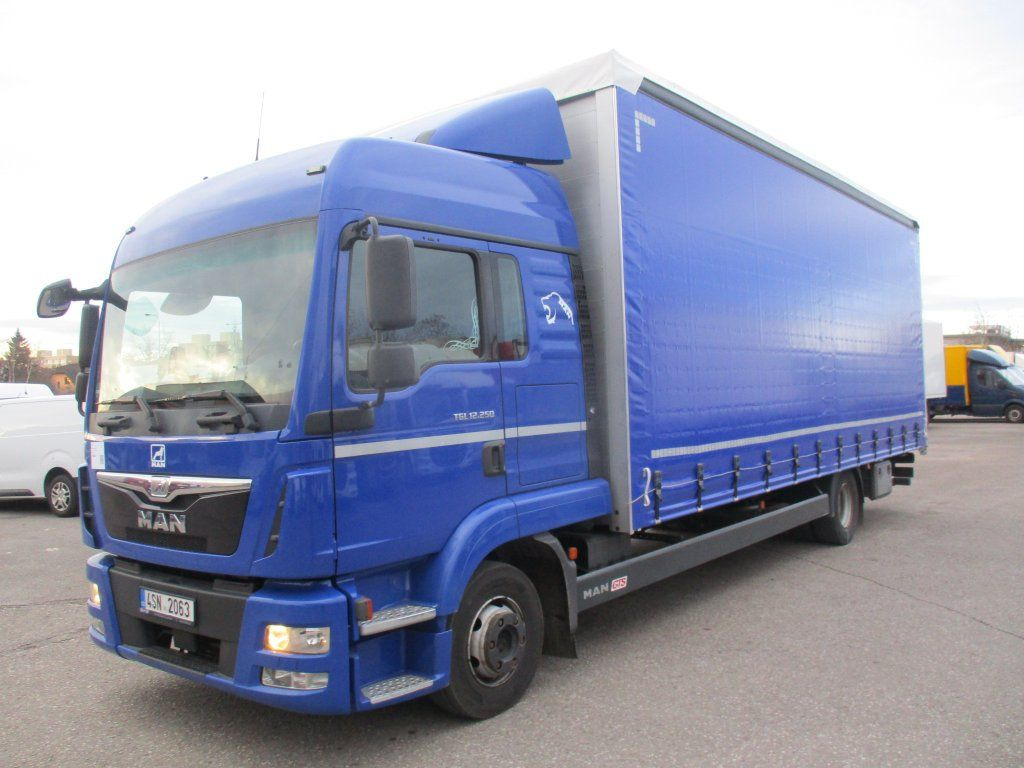 MAN TGL12.250 - Xe tải thùng mui bạt: hình 1 MAN TGL12.250 - Xe tải thùng mui bạt: hình 1