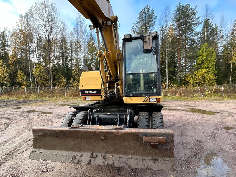 Caterpillar M312 Engcon EC20 tiltrotator - Máy xúc bánh lốp: hình 3 Caterpillar M312 Engcon EC20 tiltrotator - Máy xúc bánh lốp: hình 3