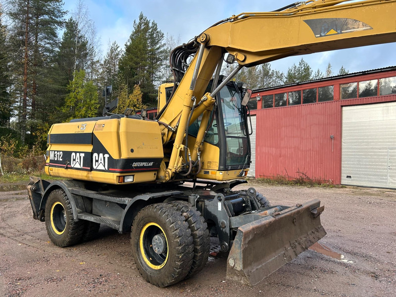 Caterpillar M312 Engcon EC20 tiltrotator - Máy xúc bánh lốp: hình 4 Caterpillar M312 Engcon EC20 tiltrotator - Máy xúc bánh lốp: hình 4