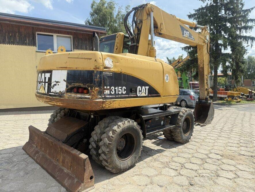 CAT M315C AC - Máy xúc bánh lốp: hình 5 CAT M315C AC - Máy xúc bánh lốp: hình 5
