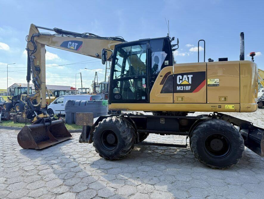 CAT M318F - Máy xúc bánh lốp: hình 1 CAT M318F - Máy xúc bánh lốp: hình 1