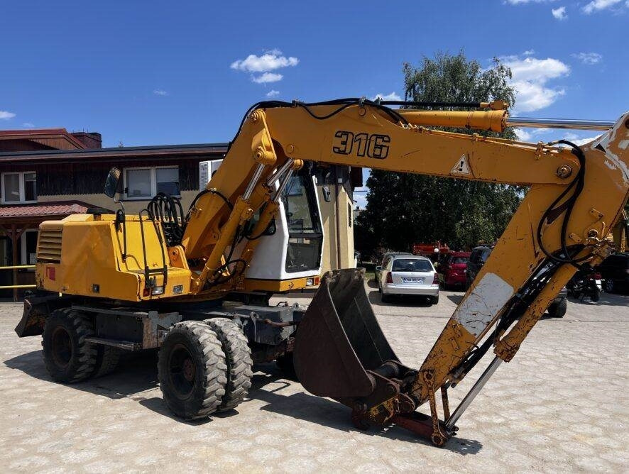 Liebherr A316 - Máy xúc bánh lốp: hình 2 Liebherr A316 - Máy xúc bánh lốp: hình 2