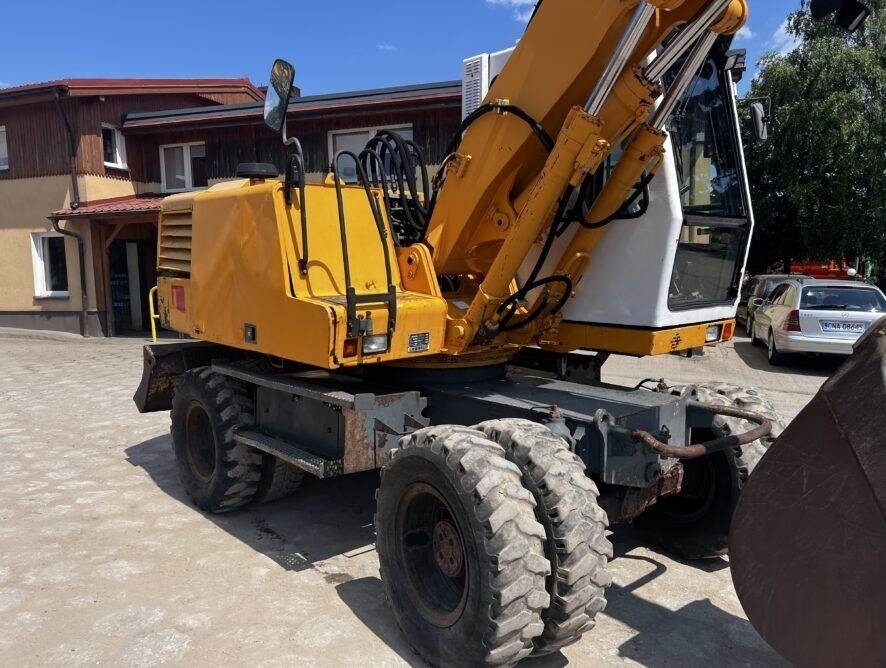Liebherr A316 - Máy xúc bánh lốp: hình 4 Liebherr A316 - Máy xúc bánh lốp: hình 4