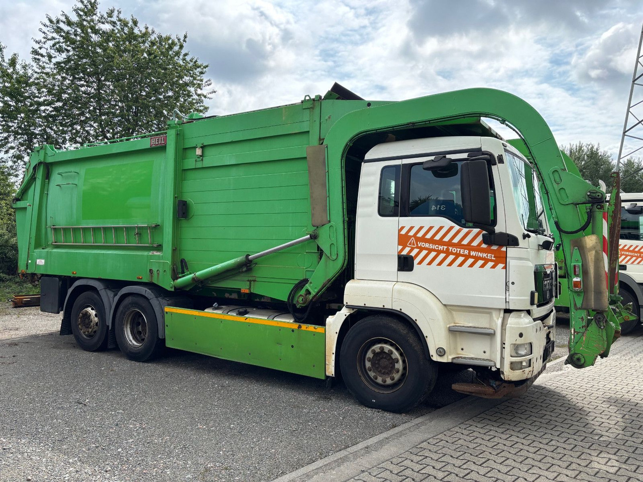 MAN TGS 26.320 EEV Heil Aufbau/Frontlader/Lift - Xe tải chở rác: hình 4 MAN TGS 26.320 EEV Heil Aufbau/Frontlader/Lift - Xe tải chở rác: hình 4