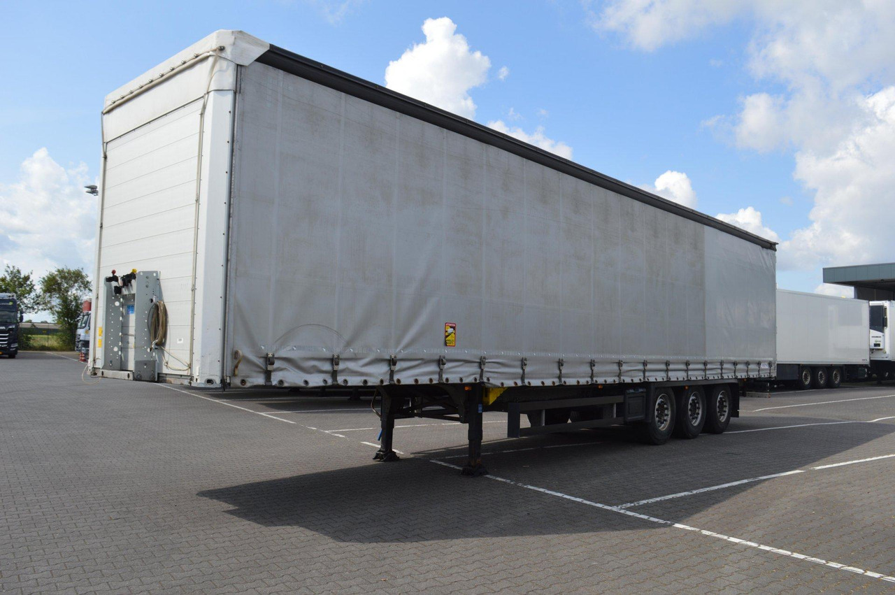 Schmitz Cargobull SCS24/L - Sơ mi rơ moóc mui bạt: hình 1 Schmitz Cargobull SCS24/L - Sơ mi rơ moóc mui bạt: hình 1