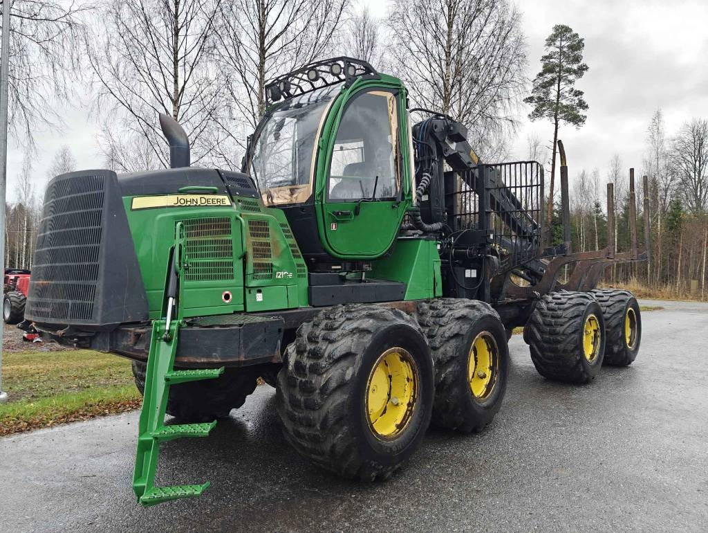 John Deere 1210 E - Máy chuyển tiếp: hình 1 John Deere 1210 E - Máy chuyển tiếp: hình 1