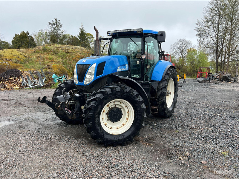 New Holland T7040 - Máy cày: hình 1 New Holland T7040 - Máy cày: hình 1