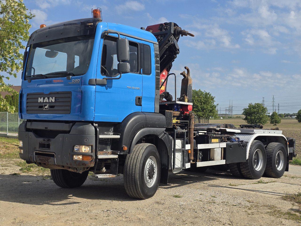 MAN TGA 33.430 6X6 / HMF 1823 K3+REM.CON./ HOOK SYSTEM - Xe tải nâng móc, Xe cẩu tự hành: hình 1 MAN TGA 33.430 6X6 / HMF 1823 K3+REM.CON./ HOOK SYSTEM - Xe tải nâng móc, Xe cẩu tự hành: hình 1