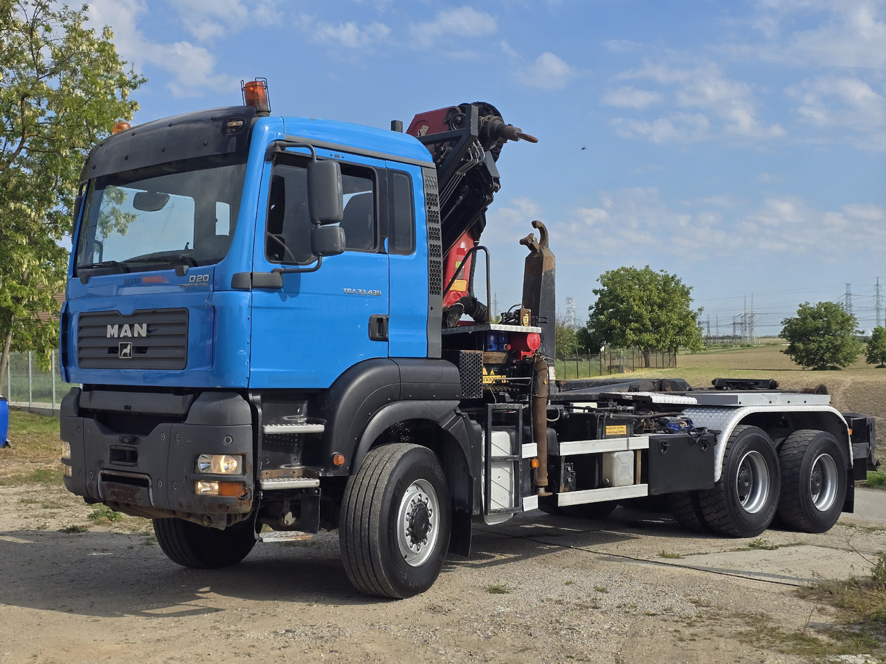 MAN TGA 33.430 6X6 / HMF 1823 K3+REM.CON./ HOOK SYSTEM - Xe tải nâng móc, Xe cẩu tự hành: hình 3 MAN TGA 33.430 6X6 / HMF 1823 K3+REM.CON./ HOOK SYSTEM - Xe tải nâng móc, Xe cẩu tự hành: hình 3