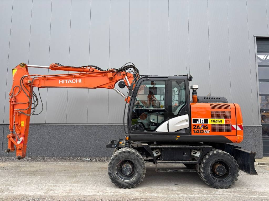 Hitachi ZX 140 W-5B - Máy xúc bánh lốp: hình 1 Hitachi ZX 140 W-5B - Máy xúc bánh lốp: hình 1
