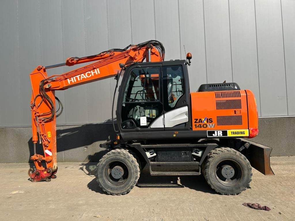 Hitachi ZX 140 W-5B - Máy xúc bánh lốp: hình 1 Hitachi ZX 140 W-5B - Máy xúc bánh lốp: hình 1