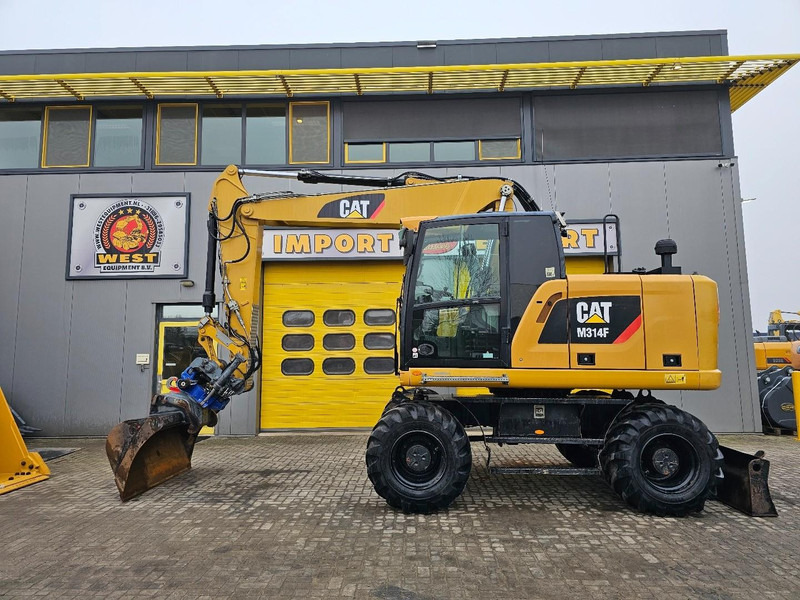 Caterpillar M314F - Máy xúc bánh lốp: hình 1 Caterpillar M314F - Máy xúc bánh lốp: hình 1