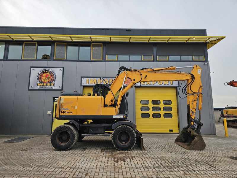 Hyundai R140W-7A - Máy xúc bánh lốp: hình 5 Hyundai R140W-7A - Máy xúc bánh lốp: hình 5