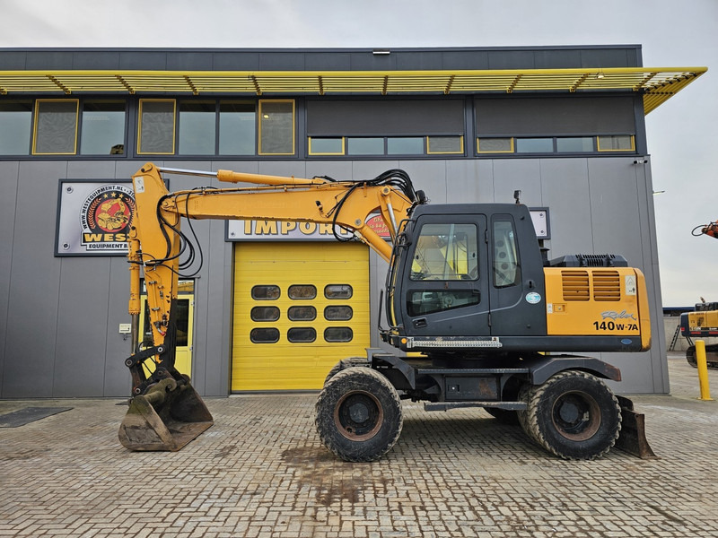 Hyundai R140W-7A - Máy xúc bánh lốp: hình 1 Hyundai R140W-7A - Máy xúc bánh lốp: hình 1