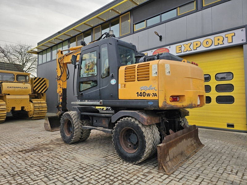 Hyundai R140W-7A - Máy xúc bánh lốp: hình 3 Hyundai R140W-7A - Máy xúc bánh lốp: hình 3