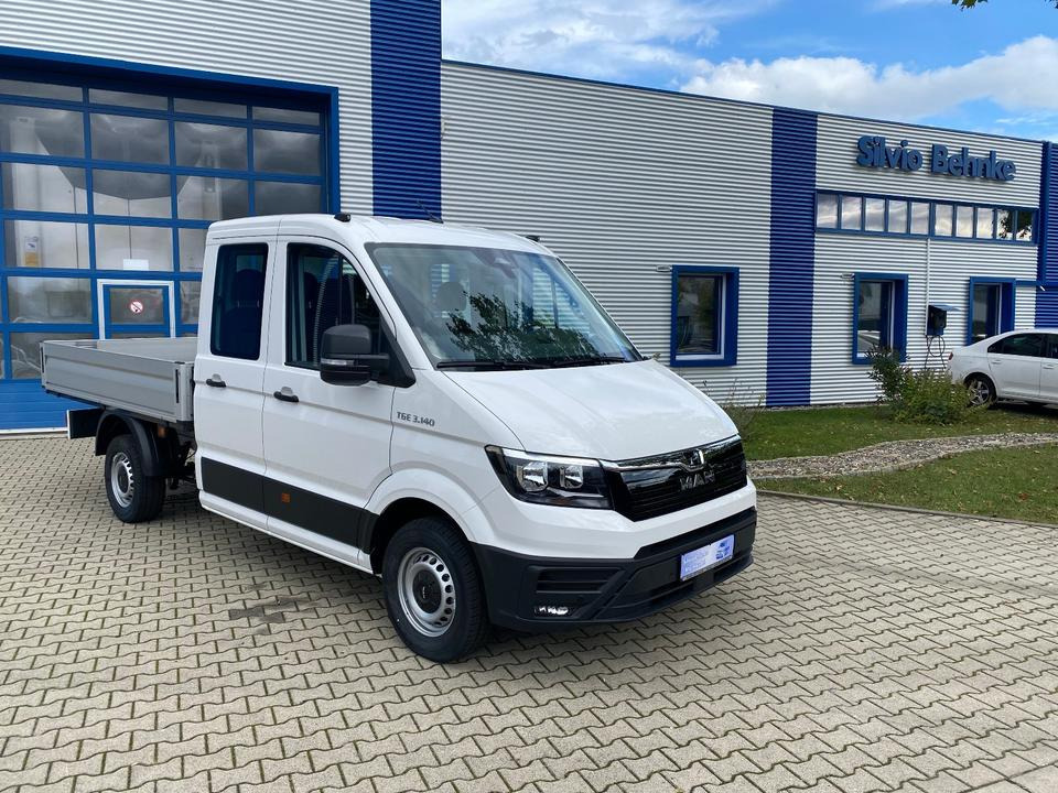 MAN TGE 3.140 Doka Pritsche Next Level *TEMPO*KLIMA*CAM*AHK*APP*PDC*INKL.19% MWST*SOFORT!* - Xe tải nhỏ phẳng, Xe tải van: hình 1 MAN TGE 3.140 Doka Pritsche Next Level *TEMPO*KLIMA*CAM*AHK*APP*PDC*INKL.19% MWST*SOFORT!* - Xe tải nhỏ phẳng, Xe tải van: hình 1