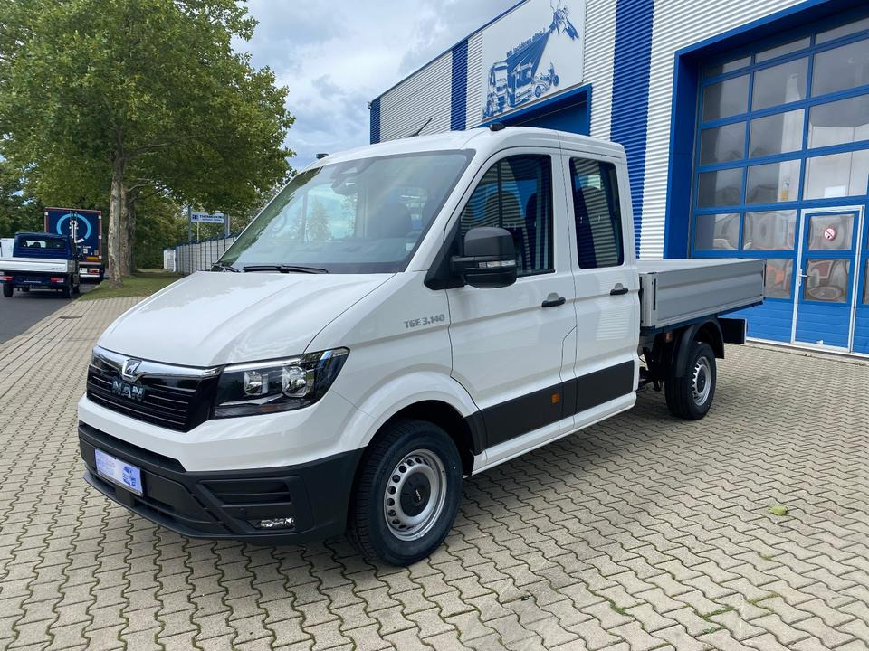 MAN TGE 3.140 Doka Pritsche Next Level *TEMPO*KLIMA*CAM*AHK*APP*PDC*INKL.19% MWST*SOFORT!* - Xe tải nhỏ phẳng, Xe tải van: hình 4 MAN TGE 3.140 Doka Pritsche Next Level *TEMPO*KLIMA*CAM*AHK*APP*PDC*INKL.19% MWST*SOFORT!* - Xe tải nhỏ phẳng, Xe tải van: hình 4