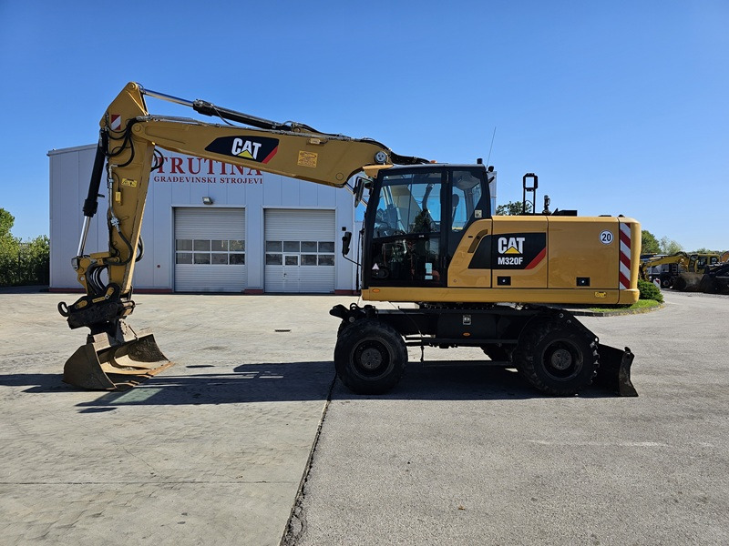 CATERPILLAR M320F - Máy xúc bánh lốp: hình 2 CATERPILLAR M320F - Máy xúc bánh lốp: hình 2