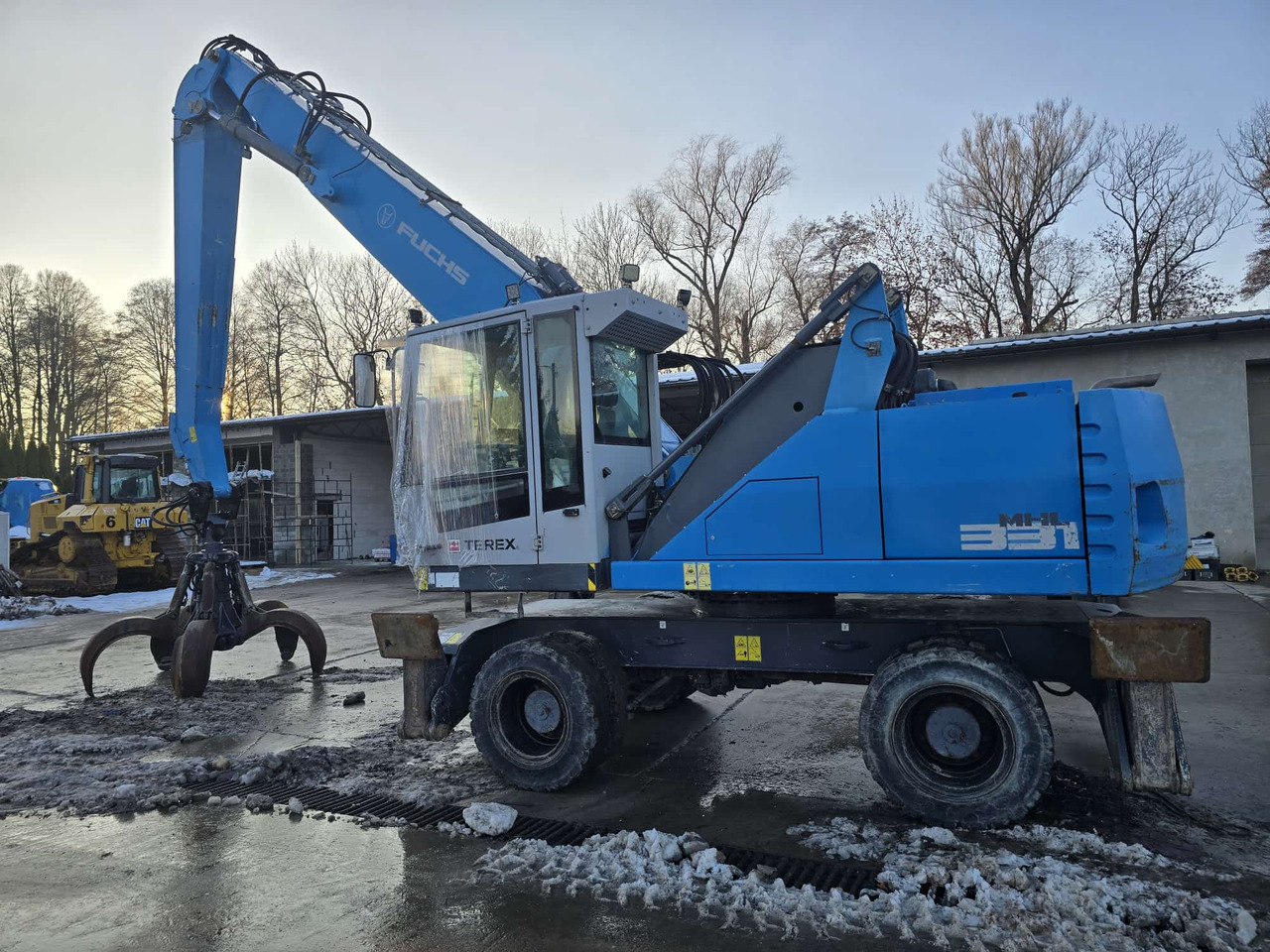 FUCHS MHL 331 - Máy cạp rác/ Công nghiệp: hình 1 FUCHS MHL 331 - Máy cạp rác/ Công nghiệp: hình 1