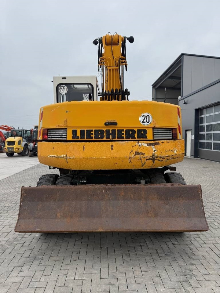 Liebherr A 312 - Máy xúc bánh lốp: hình 4 Liebherr A 312 - Máy xúc bánh lốp: hình 4