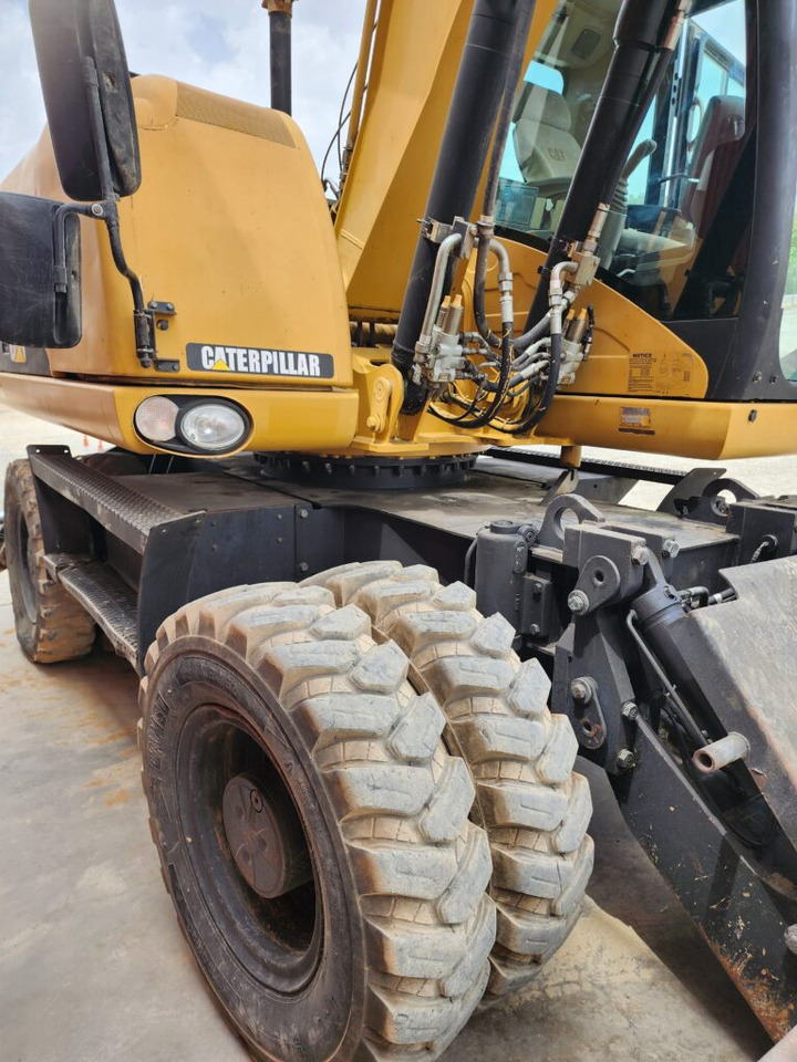 CAT M313D - Máy xúc bánh lốp: hình 4 CAT M313D - Máy xúc bánh lốp: hình 4
