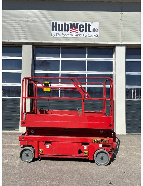Máy nâng người hình kéo Haulotte Compact 8W - 8,2m Elektro Scherenarbeitsbühne: hình 1